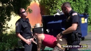 Hardcore interracial sex in the parking lot with two ROUGH cops