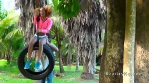 harming Ebony banging on a swinging tyre