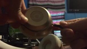 busty white beats solo2 headphones penetrated by big black headphone jack