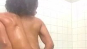 Ebony riding dildo in shower