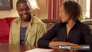Black swinger couple makes love just after signing the contract and gets ready for the swinger games