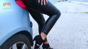 Woman walking and driving in black leather outfit