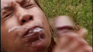 Black slut gets oiled up by her Latino lover and they fuck outdoors