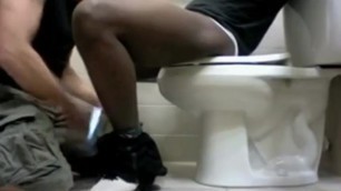 interracial blowjob in public bathroom