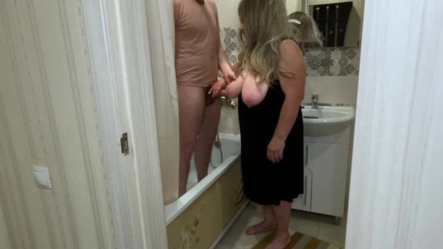 Mature MILF Jerked off his Cock in the Bathroom and Engaged in Anal Sex